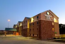 Photograph of WoodSpring Suites Signature La, Irving