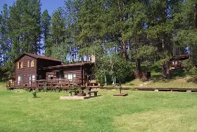 Photograph of Camp Custer Log Cabins, Custer